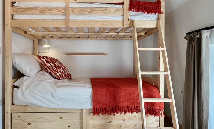 The second bedroom includes bunk beds strong enough to accomodate adults